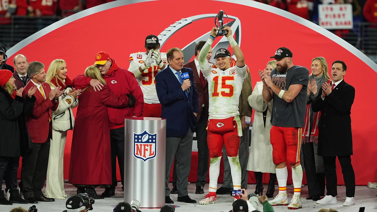Kansas City Chiefs quarterback Patrick Mahomes (15) hoists the Lamar Hunt Trophy after beating the Baltimore Ravens, 17-20, on Sunday, Jan. 28, 2024, in Baltimore, Maryland.